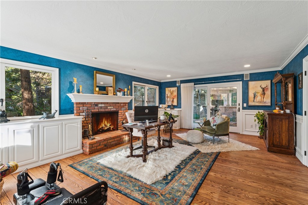 469 Golf Course Road Lake Arrowhead, CA 92352 - Photo 19 of 75 Lower lever living room fireplace