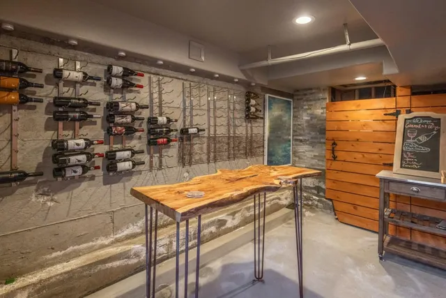 a room with water heater and a table