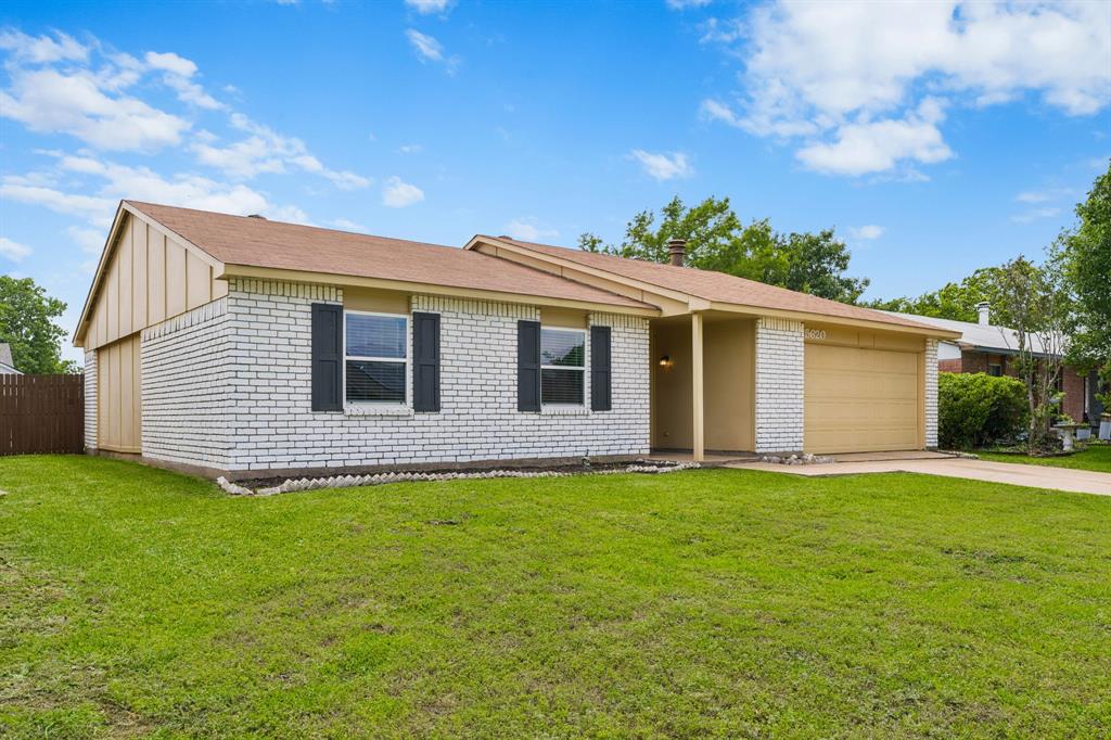 5620 Perrin Street The Colony, TX 75056 - Photo 24 of 31 a view of a house with a yard