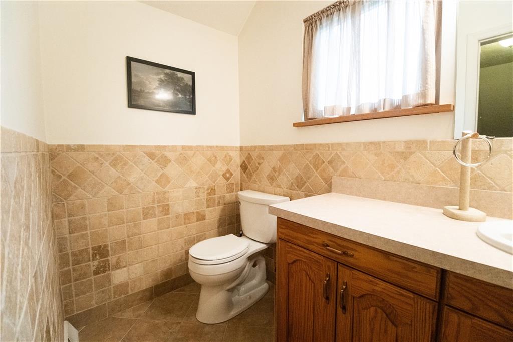 210 Whitestown Road Butler, PA 16001 - Photo 17 of 19 a bathroom with a sink and a toilet