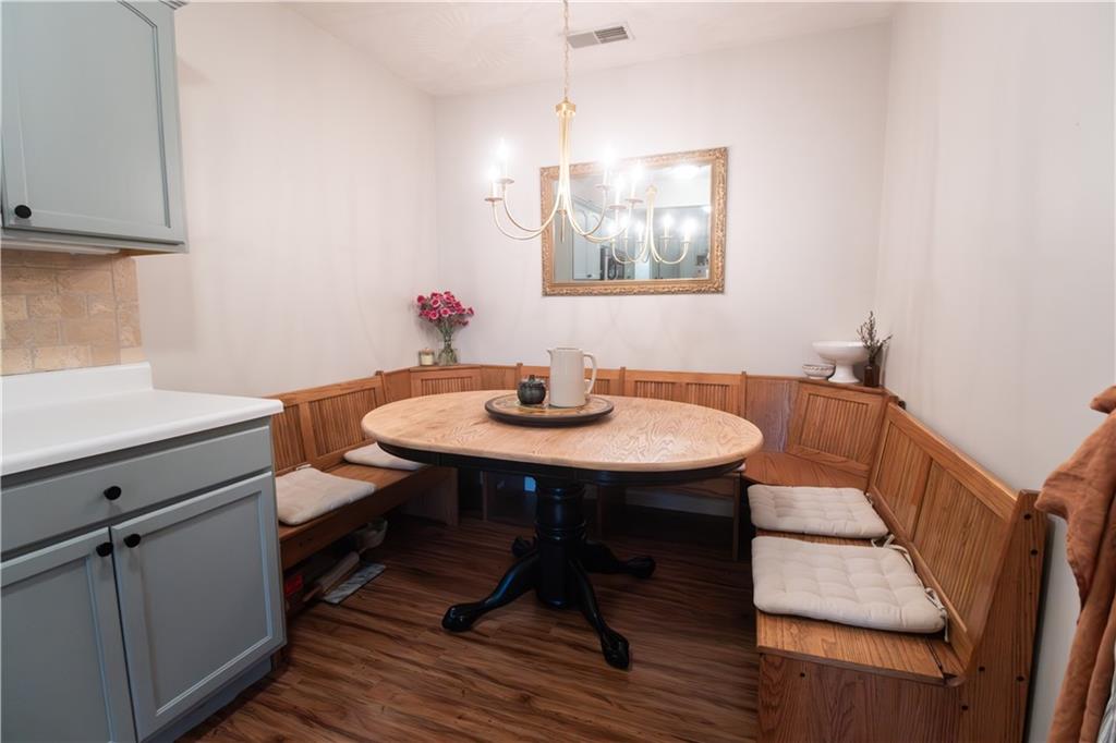 210 Whitestown Road Butler, PA 16001 - Photo 6 of 19 a view of a dining room with furniture and wooden floor