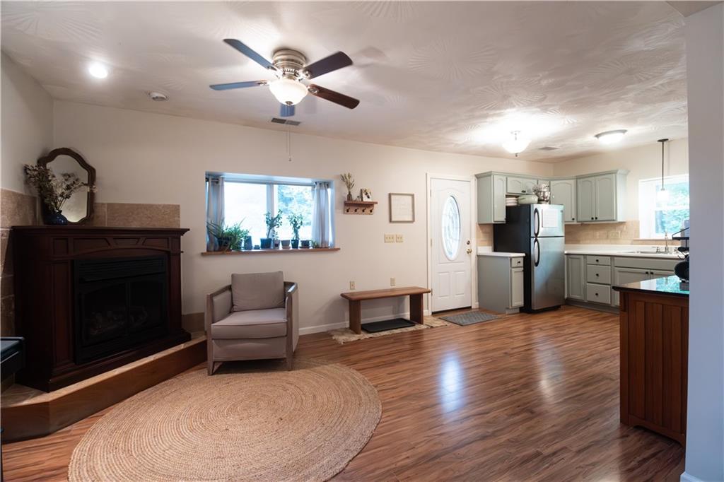 210 Whitestown Road Butler, PA 16001 - Photo 8 of 19 a living room with furniture and kitchen view