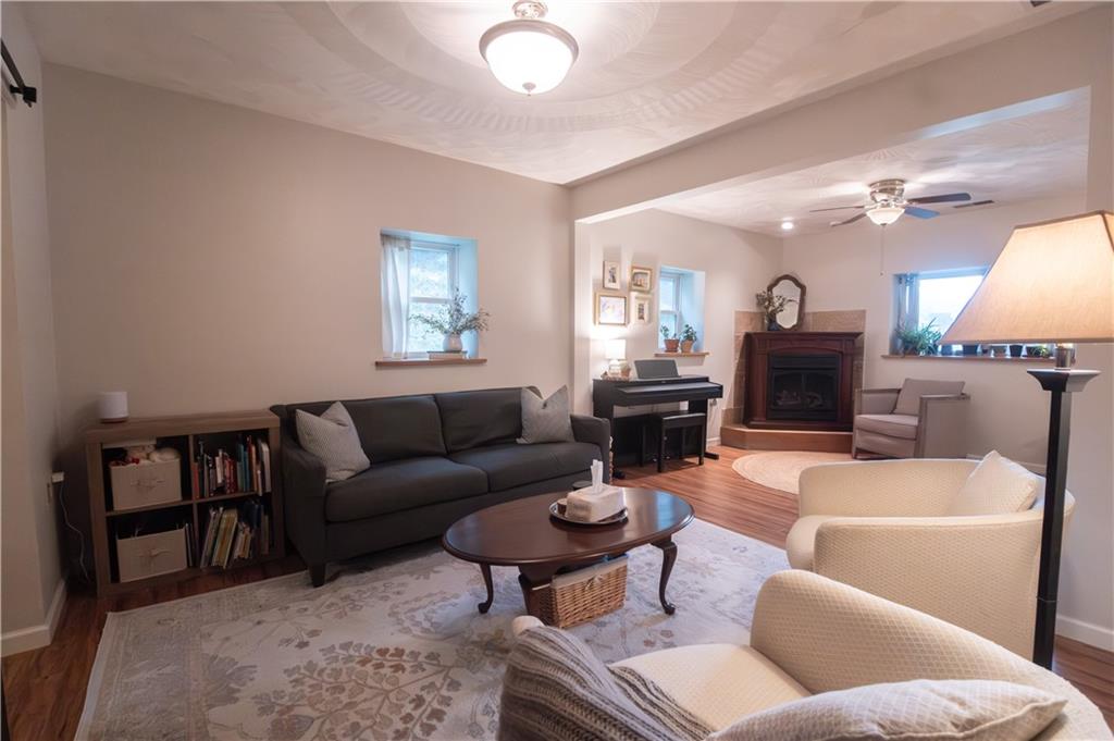 210 Whitestown Road Butler, PA 16001 - Photo 10 of 19 a living room with furniture and a lamp