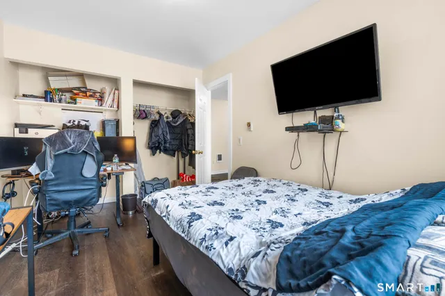 a view of a hallway with white walls