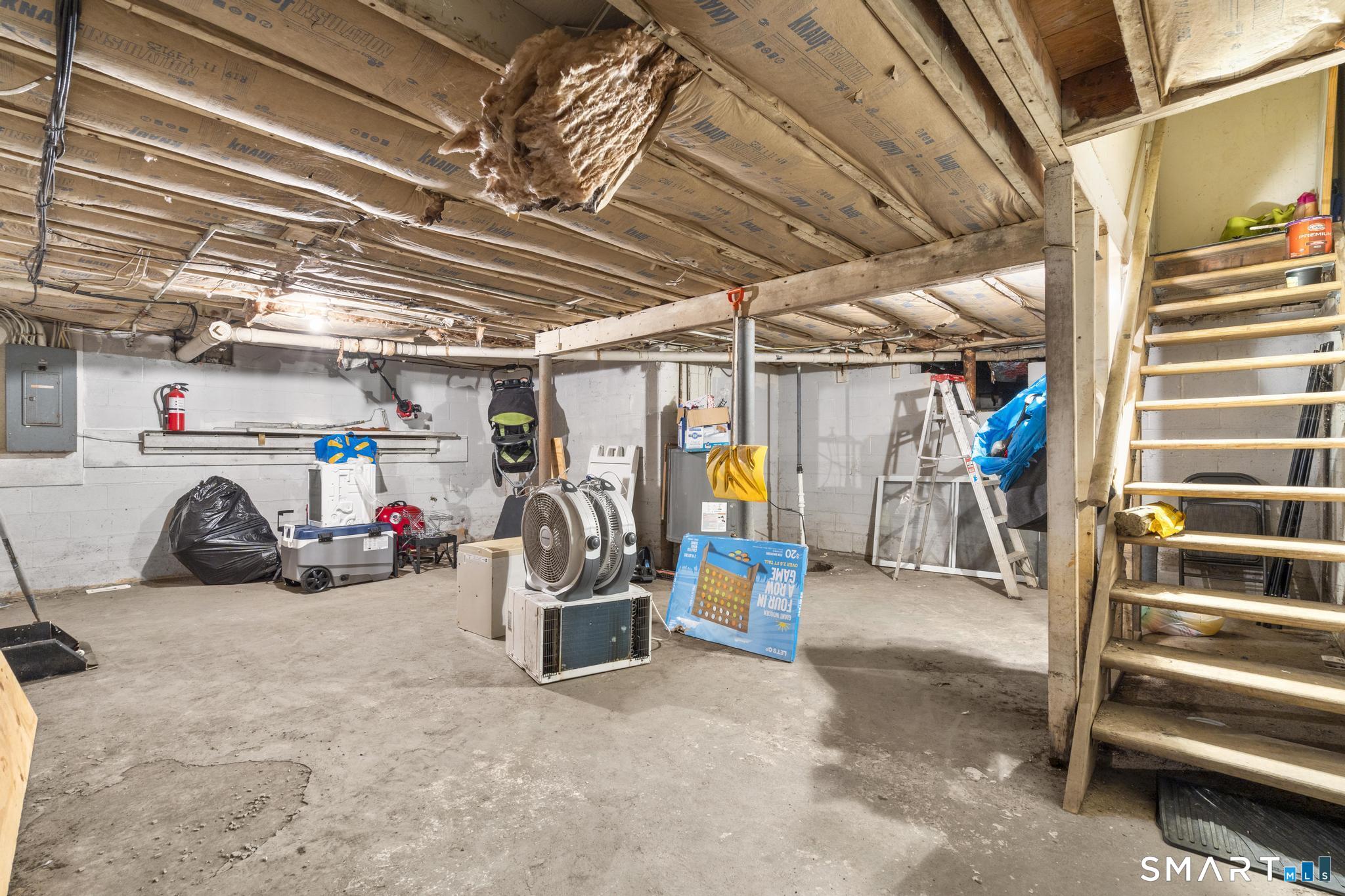84 Taylor Avenue, Unit 1 Norwalk, CT 06854 - Photo 34 of 40 a view of a garage with storage