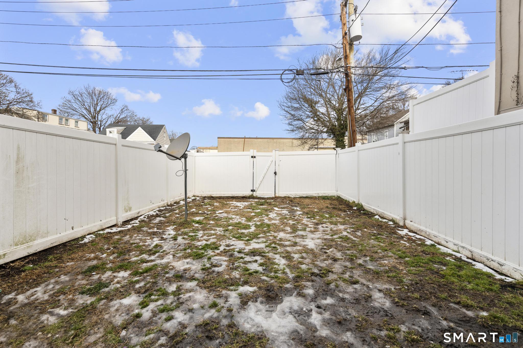 84 Taylor Avenue, Unit 1 Norwalk, CT 06854 - Photo 40 of 40 a view of a backyard