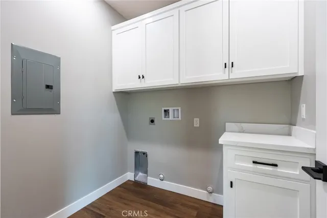 a view of cabinets and wooden floor