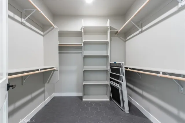 a view of an empty walk in closet