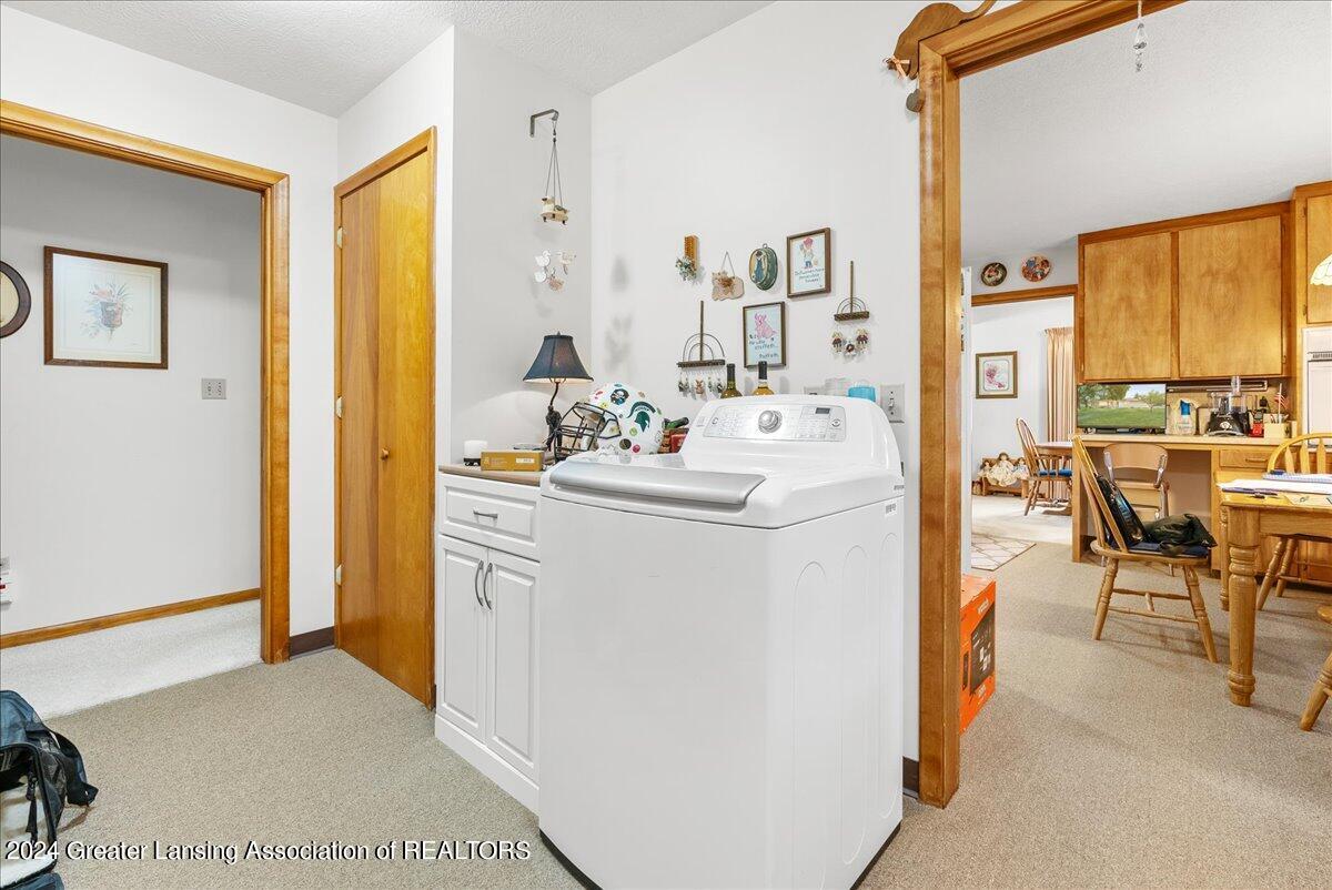 3200 Tecumseh River Road Lansing, MI 48906 - Photo 13 of 36 Main Level Laundry