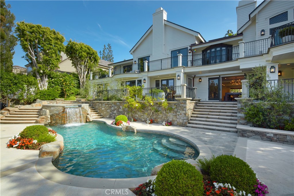 2 Royal St George Road Newport Beach, CA 92660 - Photo 39 of 48 a front view of a house with a yard