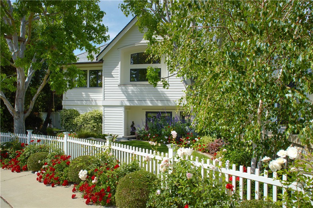 2 Royal St George Road Newport Beach, CA 92660 - Photo 44 of 48 a front view of a house with a yard and potted plants
