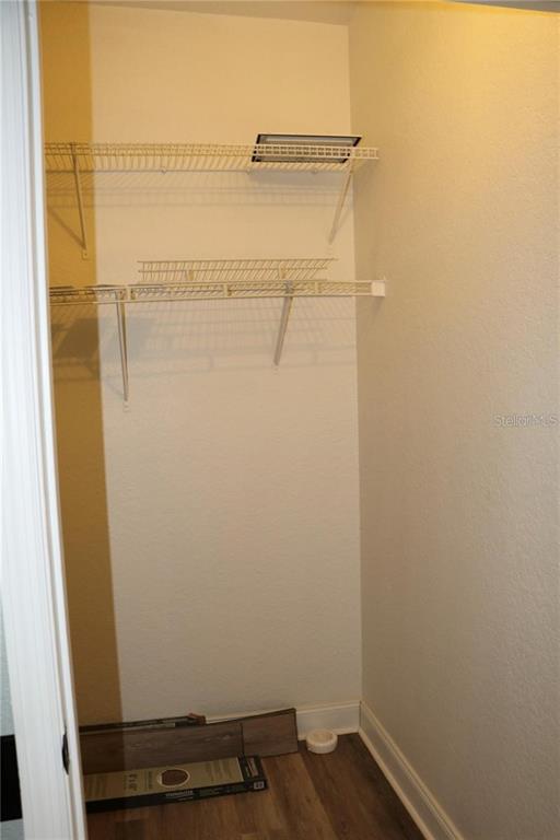 13548 Turtle Marsh Loop, Unit 413 Orlando, FL 32837 - Photo 12 of 27 a view of a room with racks on the wall