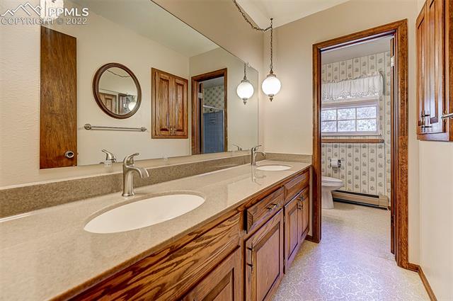 11020 Hungate Road Colorado Springs, CO 80908 - Photo 19 of 42 upstairs bathroom