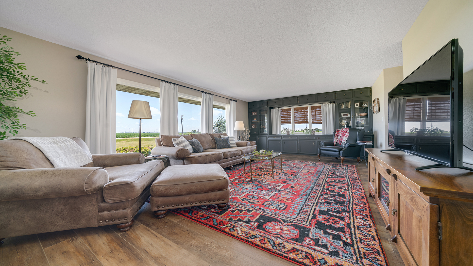 1195 Atkinson Road Harmon, IL 61042 - Photo 13 of 53 a living room with furniture and a flat screen tv
