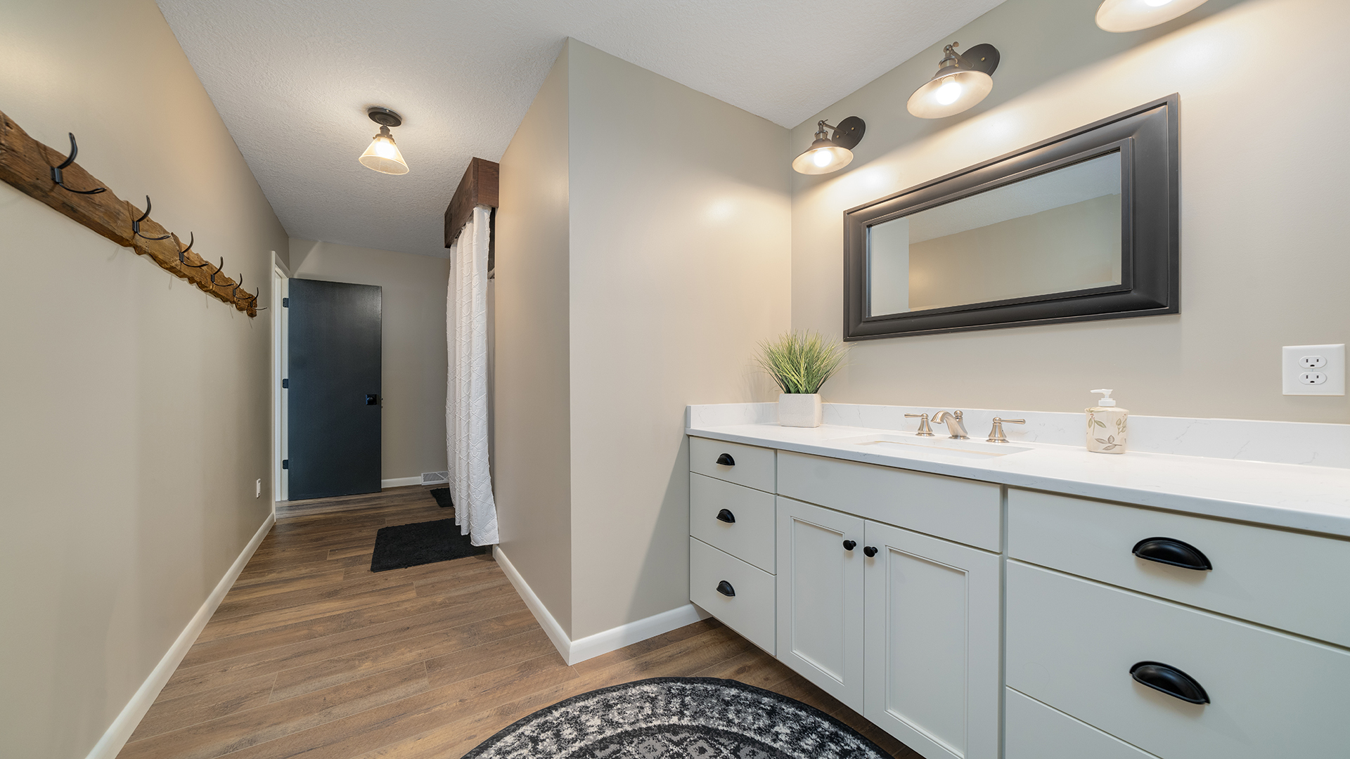 1195 Atkinson Road Harmon, IL 61042 - Photo 19 of 53 a bathroom with a double vanity sink and mirror
