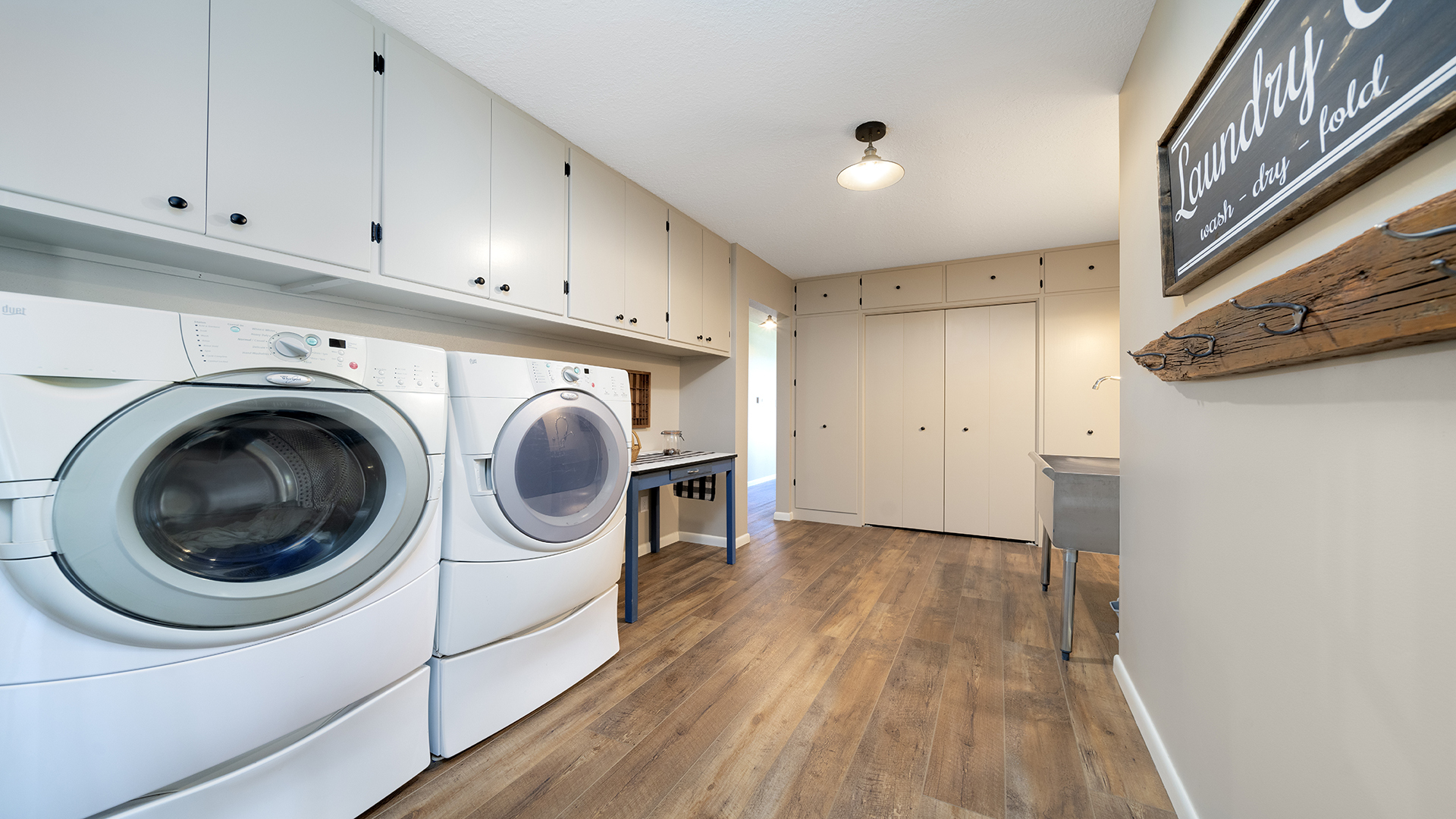 1195 Atkinson Road Harmon, IL 61042 - Photo 22 of 53 a utility room with wooden floor washer and dryer
