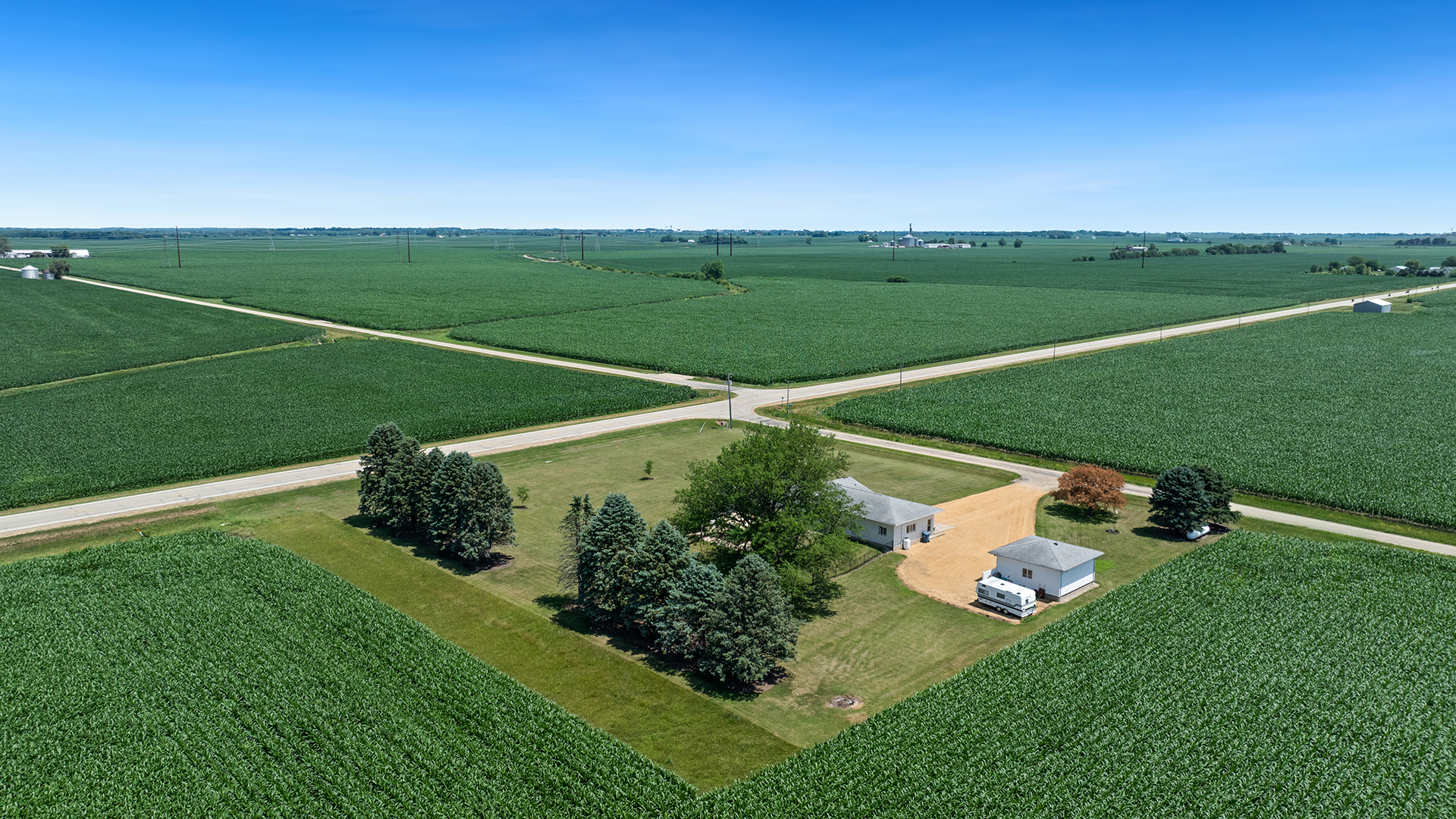 1195 Atkinson Road Harmon, IL 61042 - Photo 50 of 53 a view of a golf course with a garden