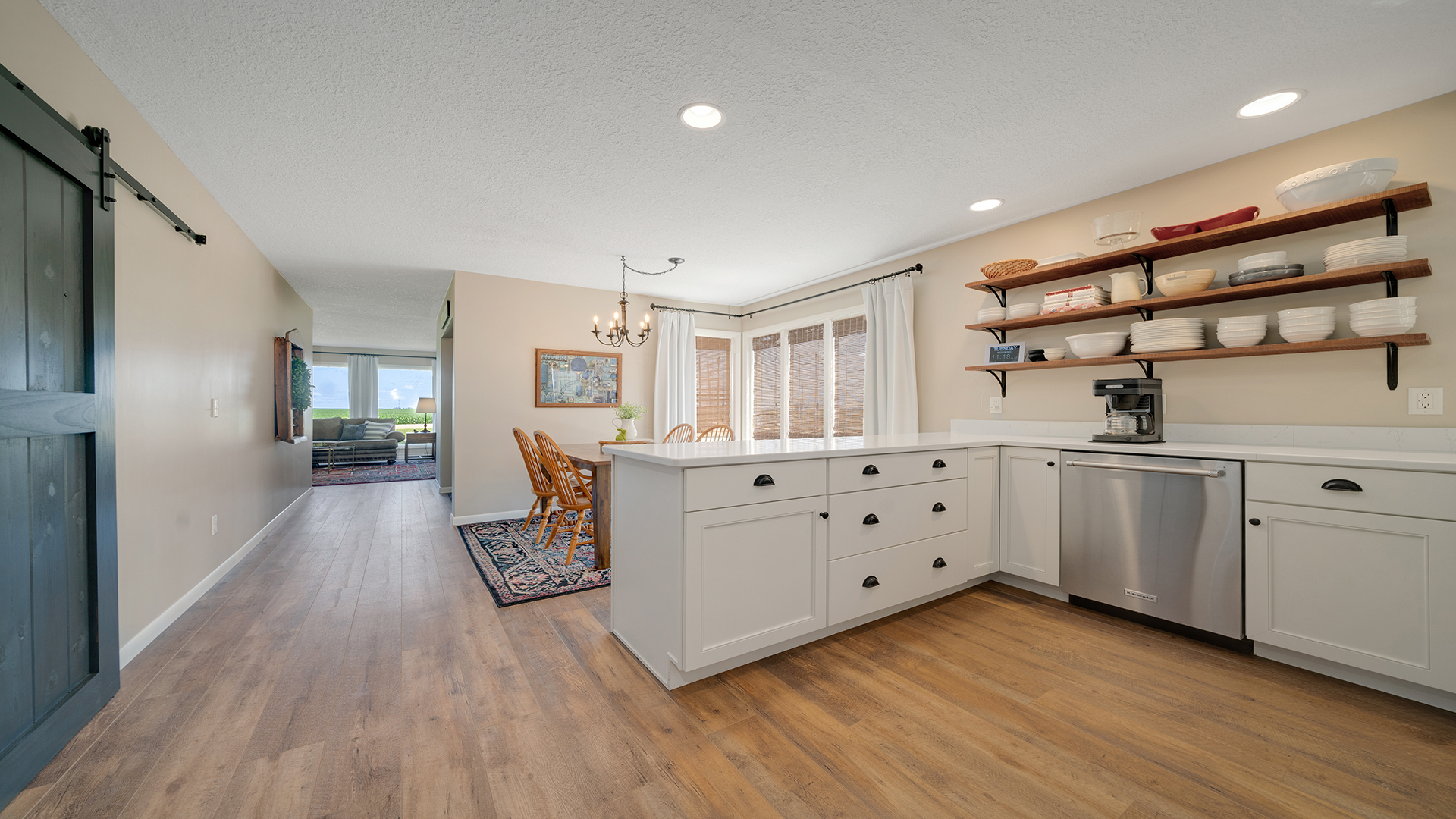 1195 Atkinson Road Harmon, IL 61042 - Photo 7 of 53 a kitchen with white cabinets and wooden floors