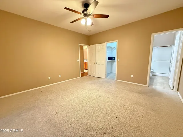 a bathroom with a sink and a large mirror