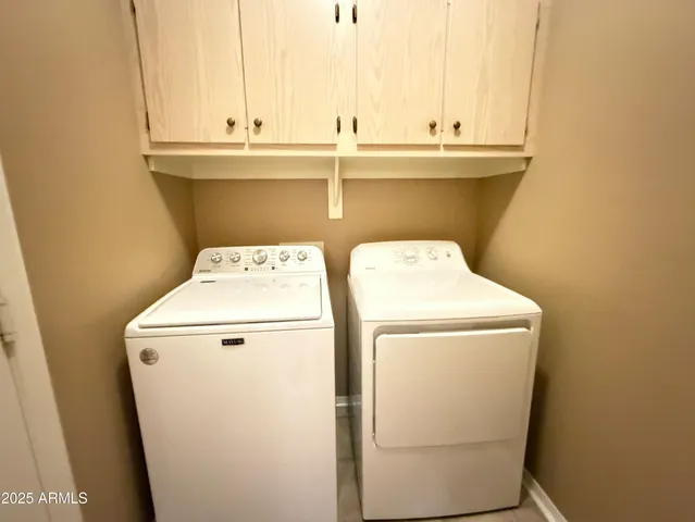 a view of a backyard of the house