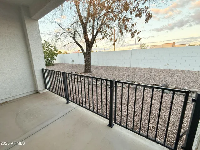 a view of a garden with a fountain