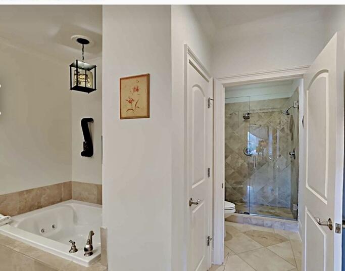 2421 West County Highway 30A, Unit E303 Santa Rosa Beach, FL 32459 - Photo 16 of 23 a bathroom with a shower