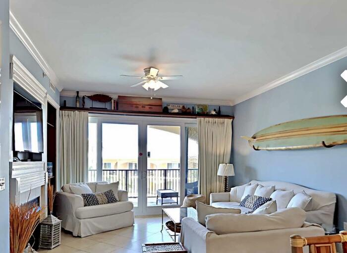 2421 West County Highway 30A, Unit E303 Santa Rosa Beach, FL 32459 - Photo 8 of 23 a living room with furniture and a large window