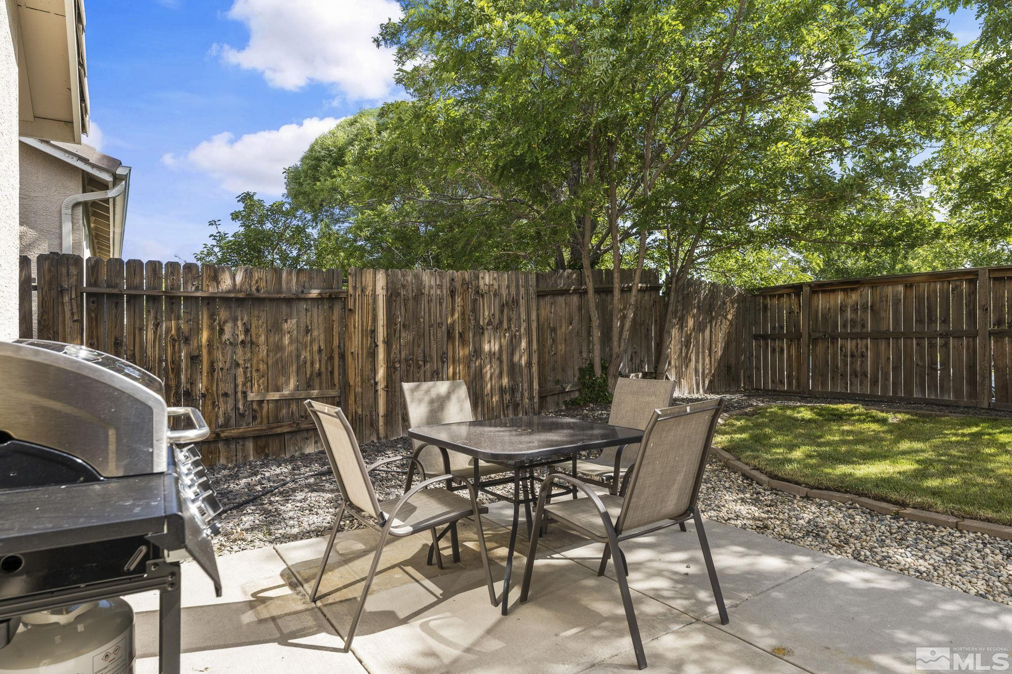10640 Arbor Way Reno, NV 89521 - Photo 28 of 37 a view of a chairs and table in the patio