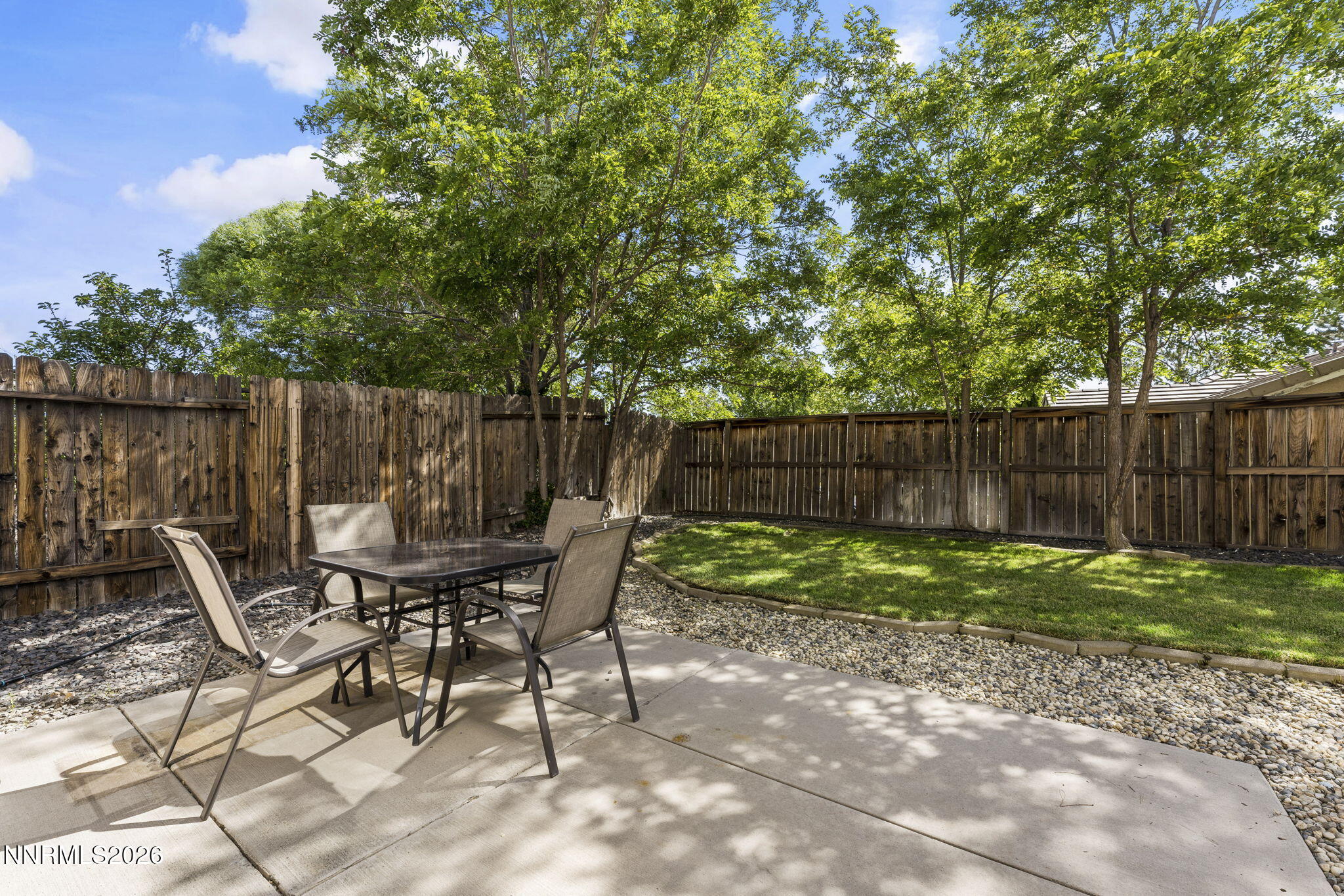 10640 Arbor Way Reno, NV 89521 - Photo 29 of 36 a view of chair and table in the backyard