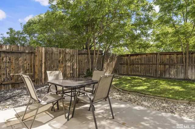 a front view of house with yard and seating space