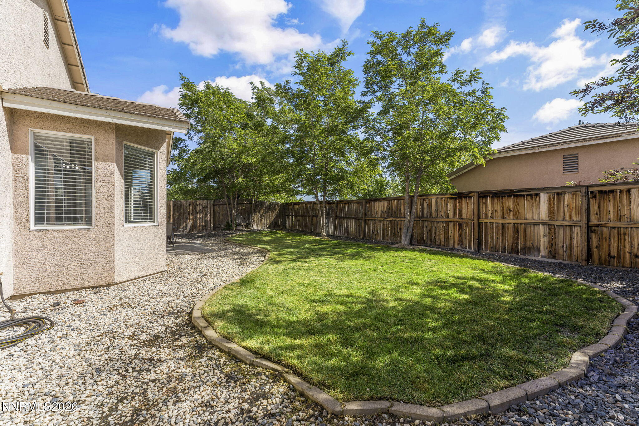 10640 Arbor Way Reno, NV 89521 - Photo 31 of 36 a view of a backyard with a garden