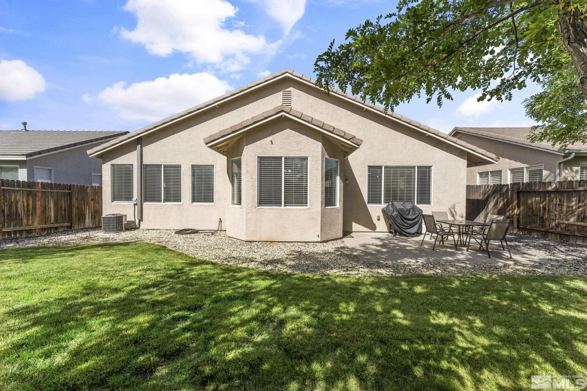 10640 Arbor Way Reno, NV 89521 - Photo 32 of 37 a view of a house with backyard