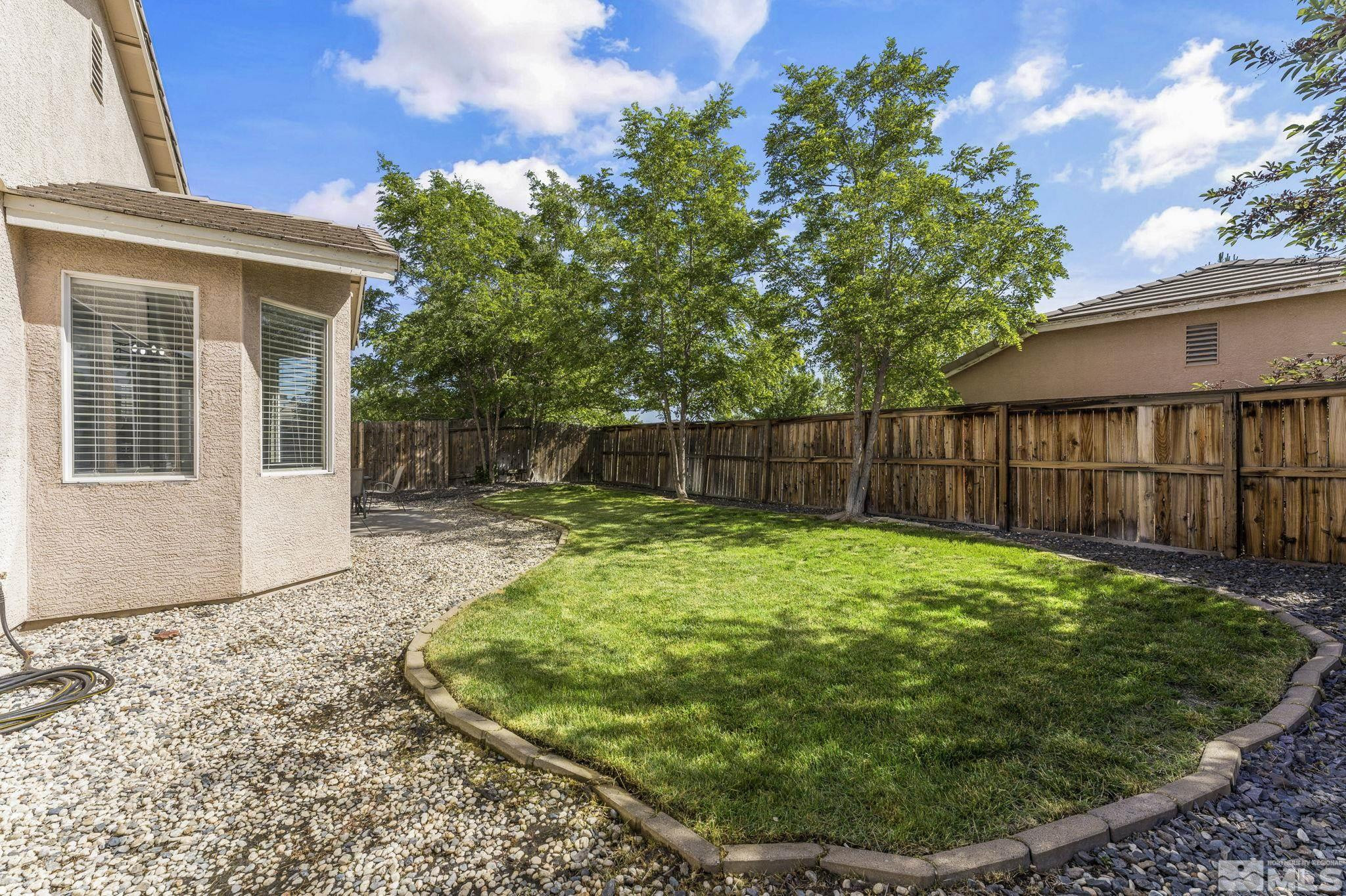 10640 Arbor Way Reno, NV 89521 - Photo 34 of 37 a view of a backyard with a garden