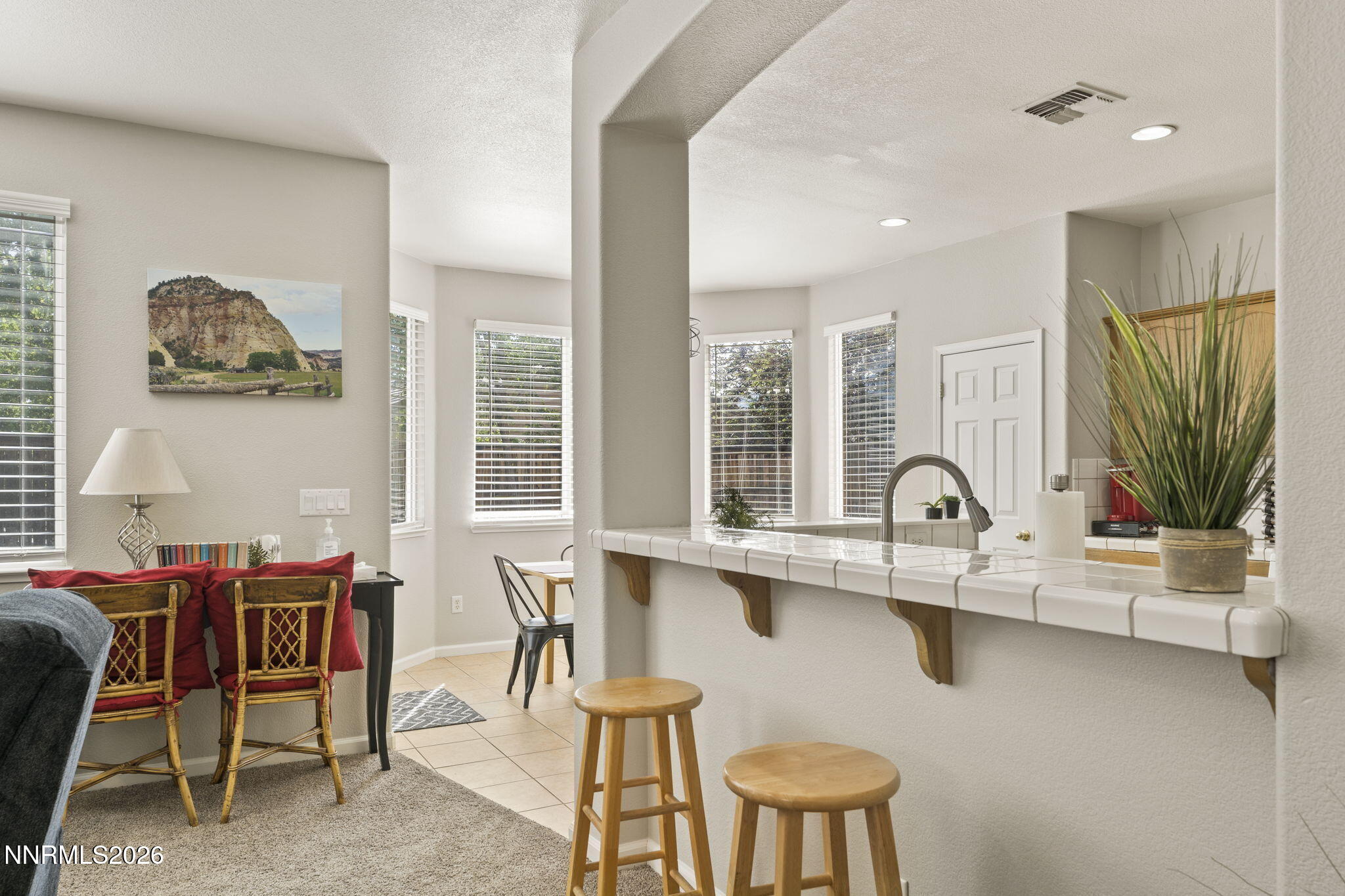10640 Arbor Way Reno, NV 89521 - Photo 5 of 36 a view of a dining room with furniture window and outside view