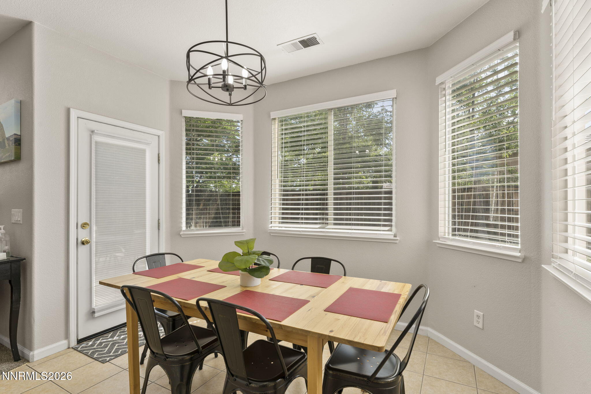 10640 Arbor Way Reno, NV 89521 - Photo 6 of 36 a view of a dining room with furniture window and outside view