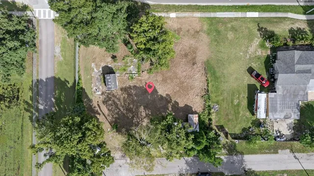a view of outdoor space with deck and trees