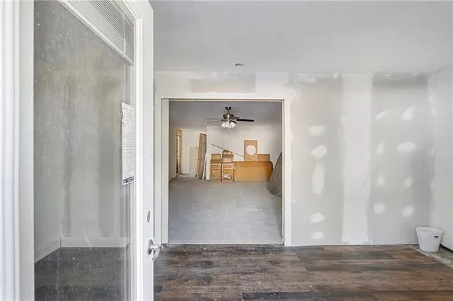 a view of a bathroom from the hallway