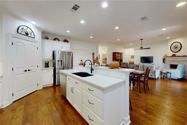 a view of a backyard with sitting area