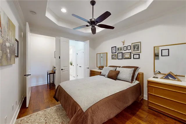 a living room with furniture kitchen view and a window
