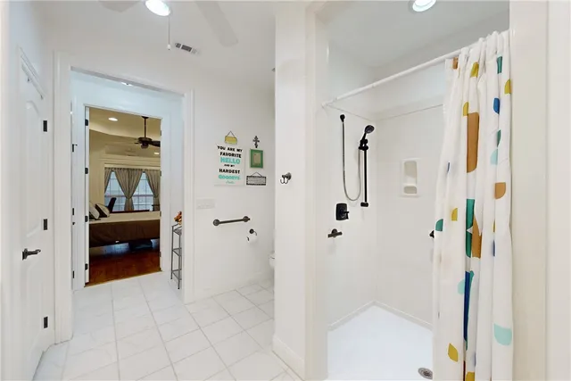a bathroom with a double vanity sink and mirror
