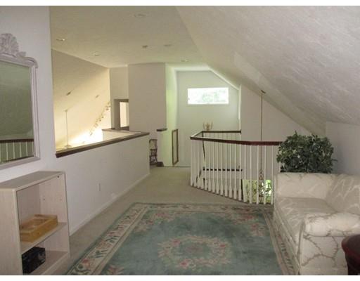 595 Boxford Road Haverhill, MA 01835 - Photo 23 of 26 a view of a hallway to a livingroom with furniture