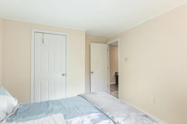 a view of a bedroom with closet