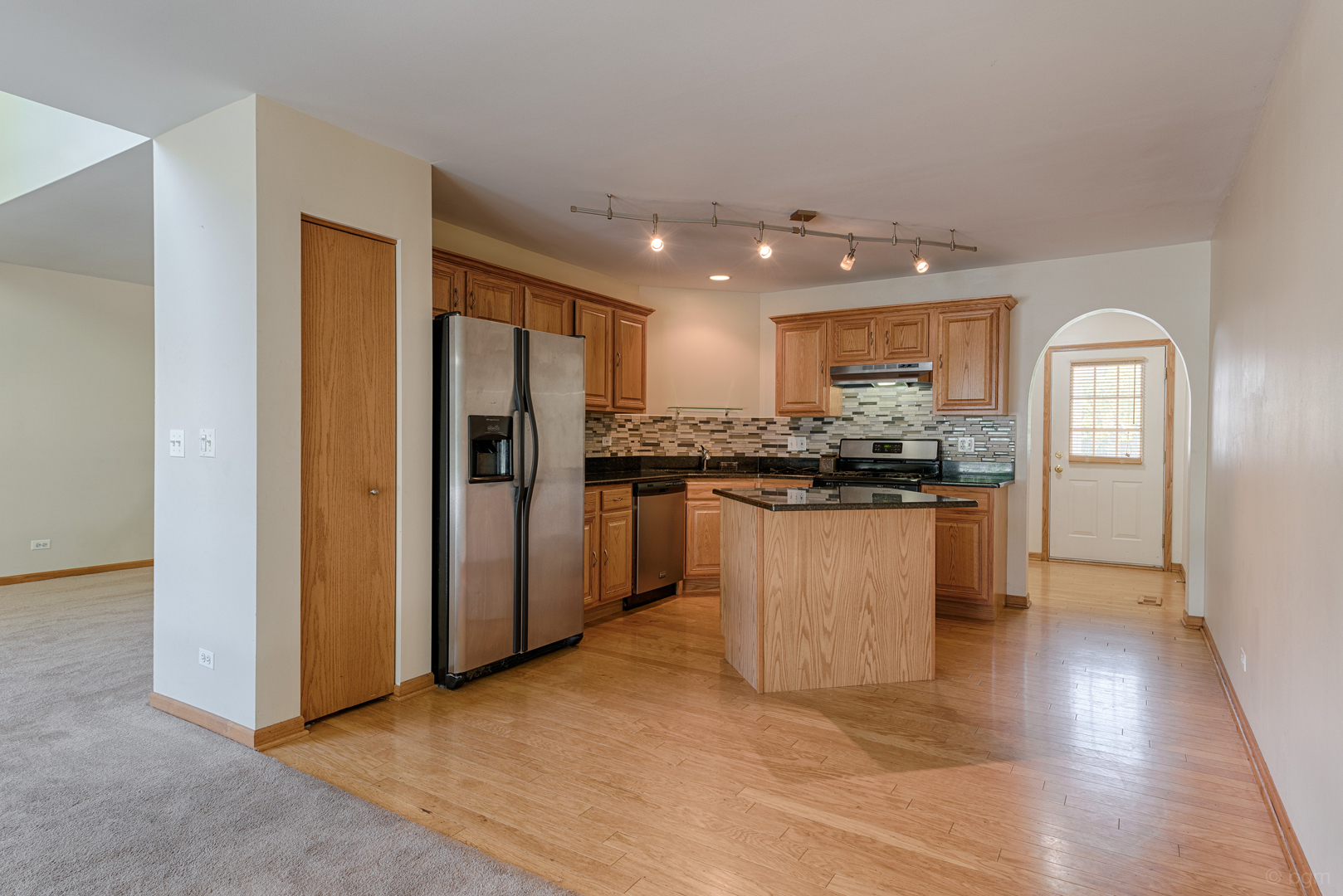 3261 Cool Springs Court Naperville, IL 60564 - Photo 2 of 25 a kitchen with stainless steel appliances granite countertop a refrigerator and a stove top oven