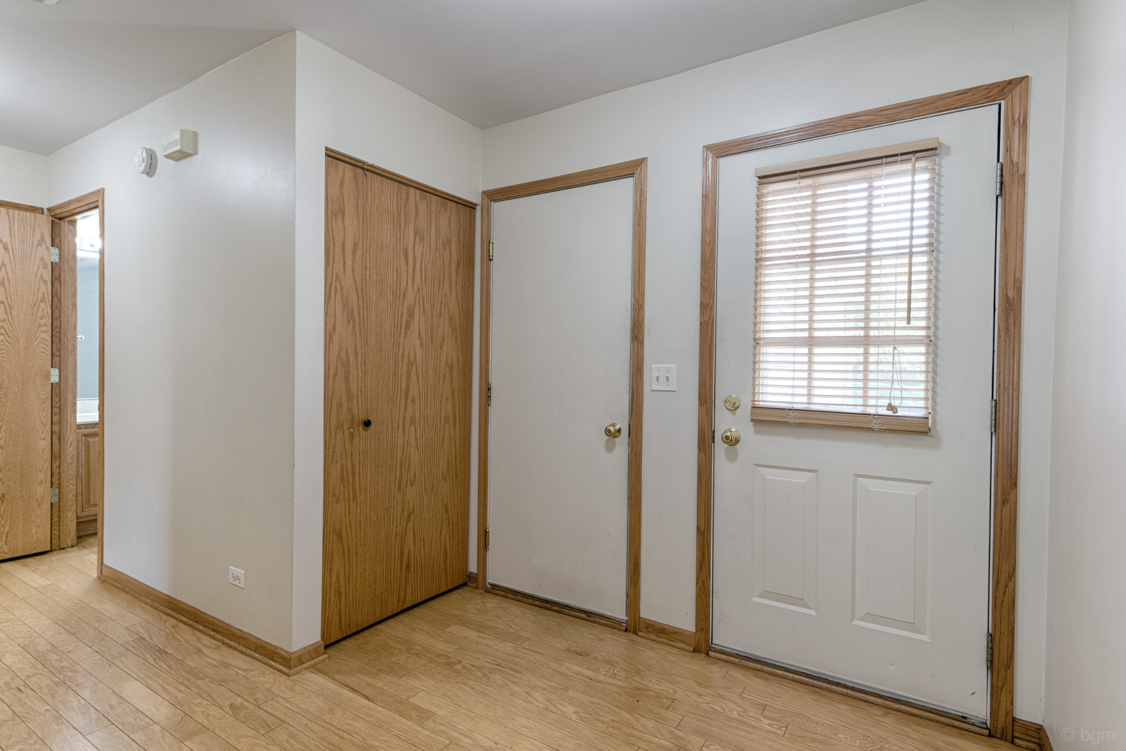 3261 Cool Springs Court Naperville, IL 60564 - Photo 20 of 25 a view of an empty room with wooden floor and closet area