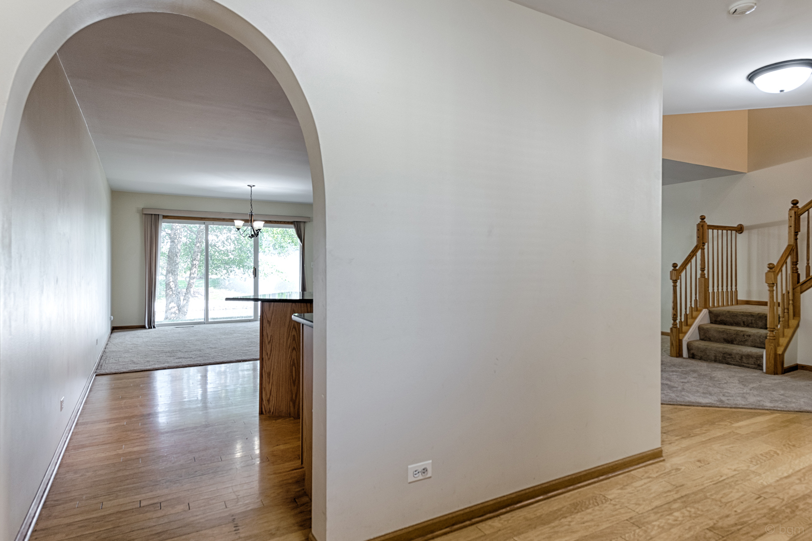 3261 Cool Springs Court Naperville, IL 60564 - Photo 21 of 25 a view of empty room with wooden floor and fan
