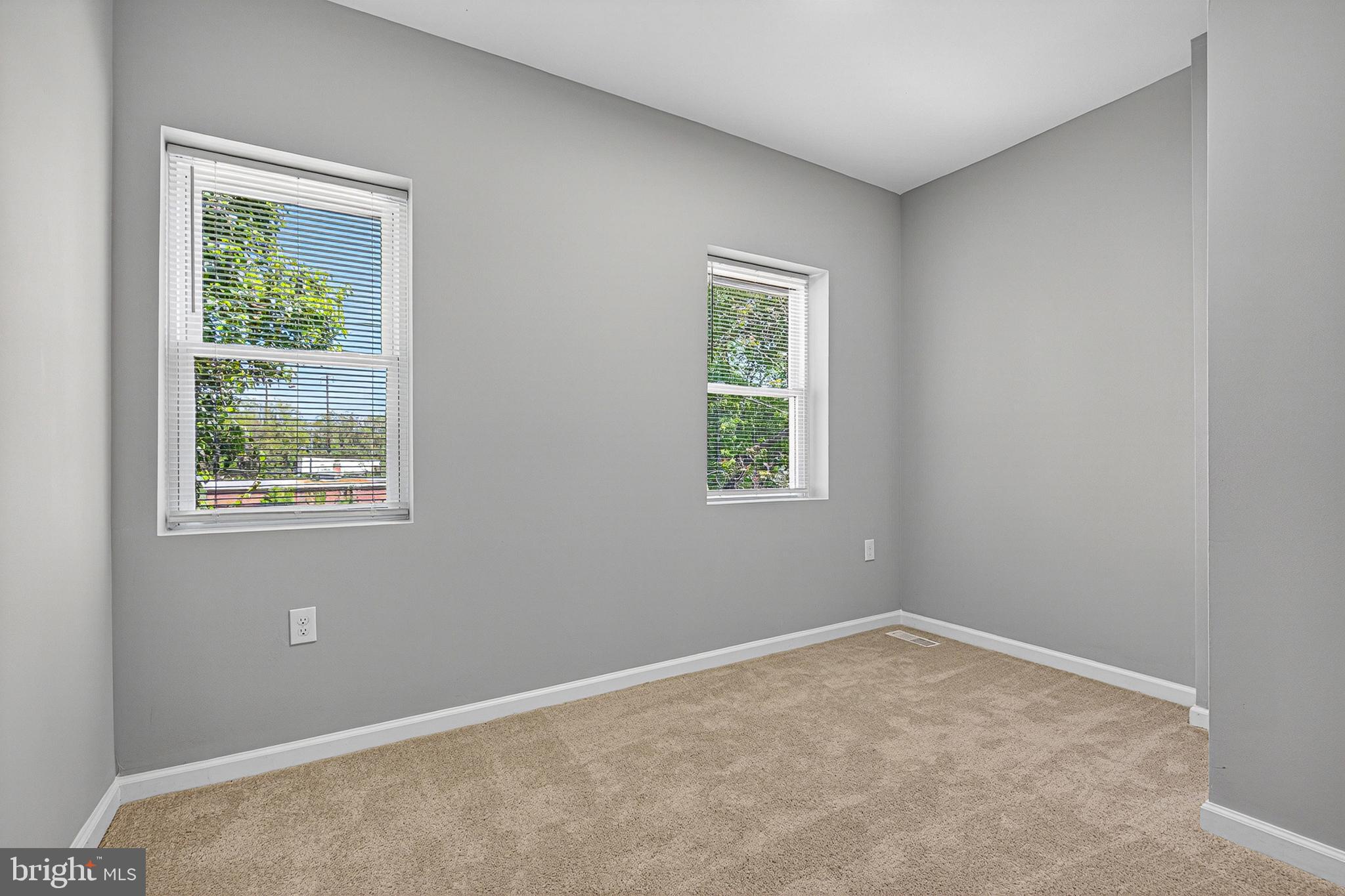 2518 West Fayette Street Baltimore, MD 21223 - Photo 11 of 32 an empty room with a window