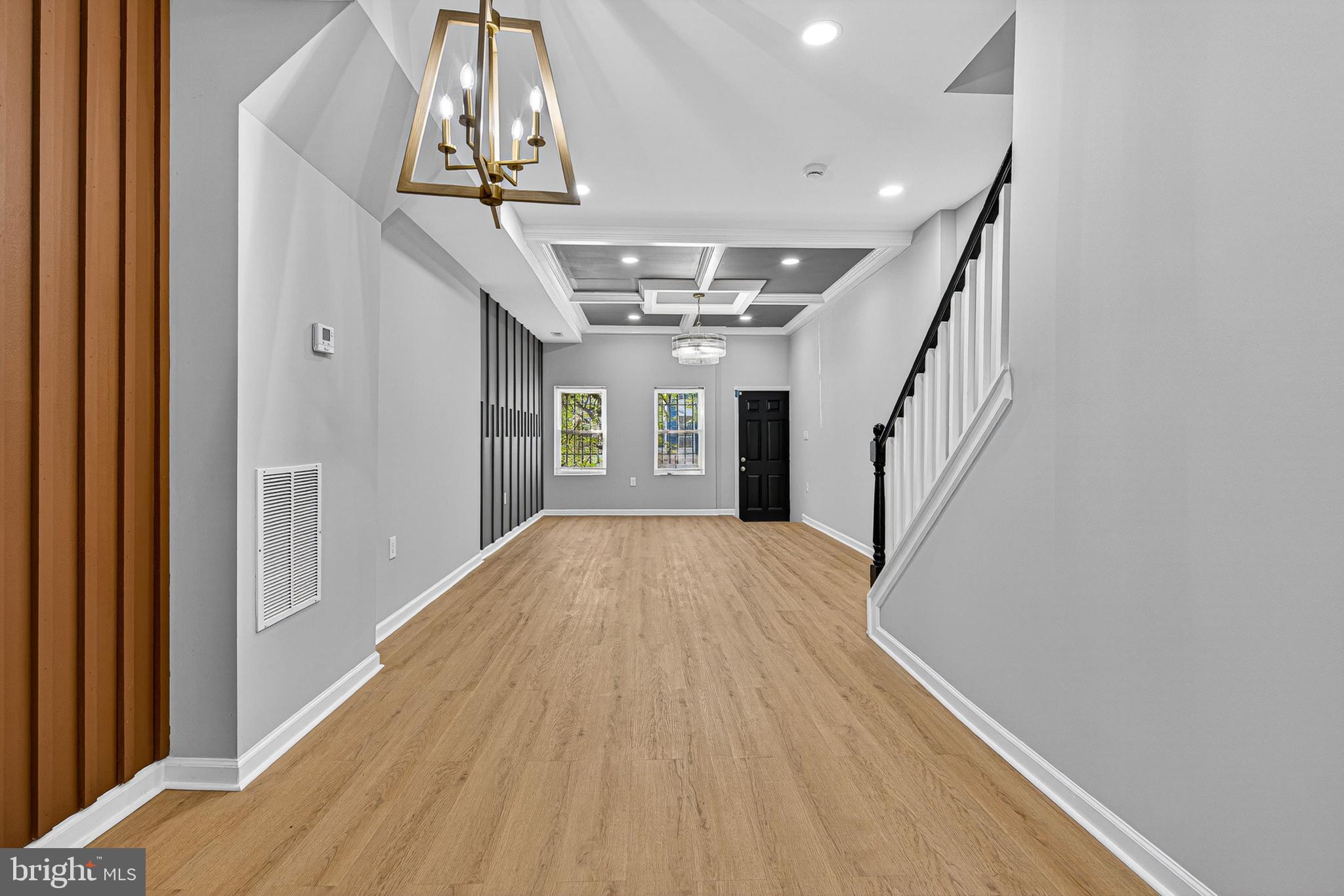 2518 West Fayette Street Baltimore, MD 21223 - Photo 10 of 32 a view of an entryway with wooden floor
