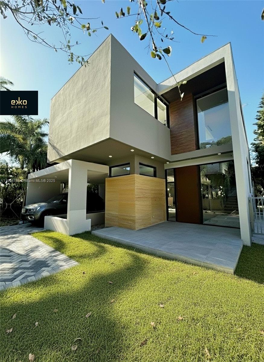 a view of an chairs and table in a room