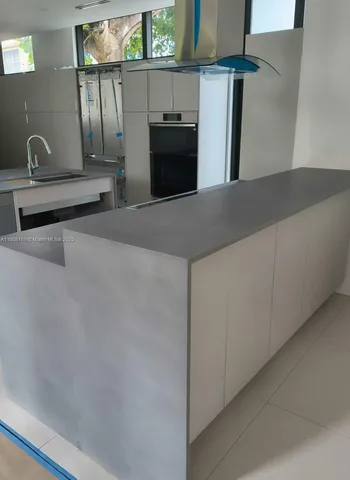 a view of a room with a hallway