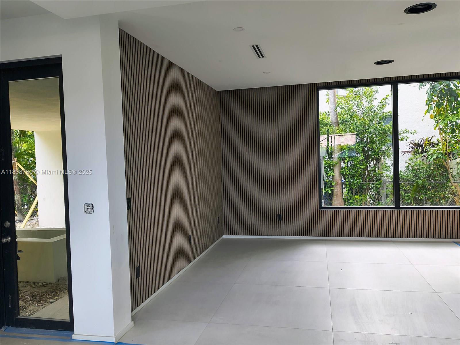 234 Southwest 22nd Road Miami, FL 33129 - Photo 15 of 31 a view of room with a large window